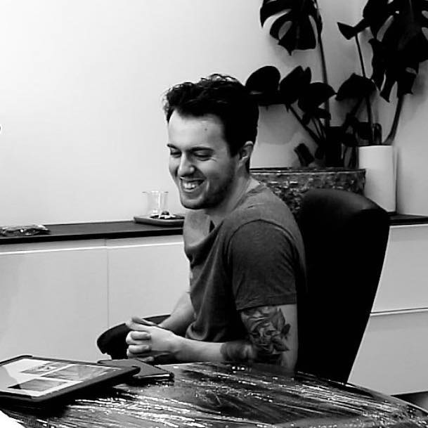 Black and white photo of artist, Sam Mayle